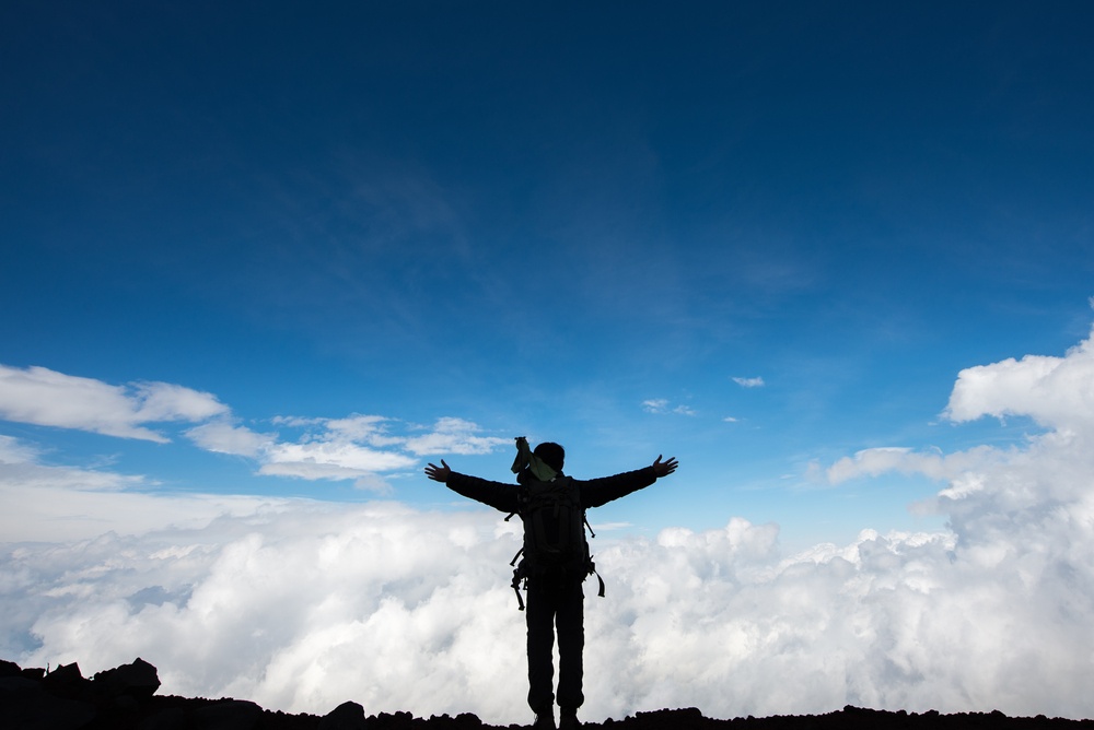 Hiker shadow on Summit of Mount Fuji,