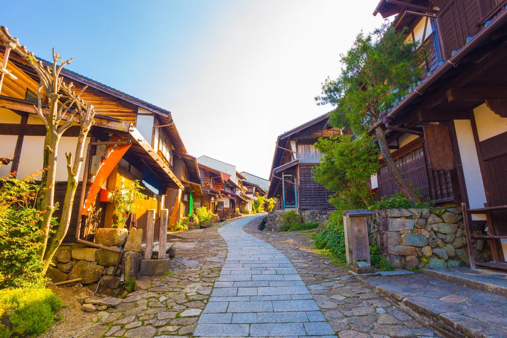 Beautifully restored wooden houses on the Nakasendo trail in the ancient post town of Magome, Kiso Valley, Japan. Horizonta