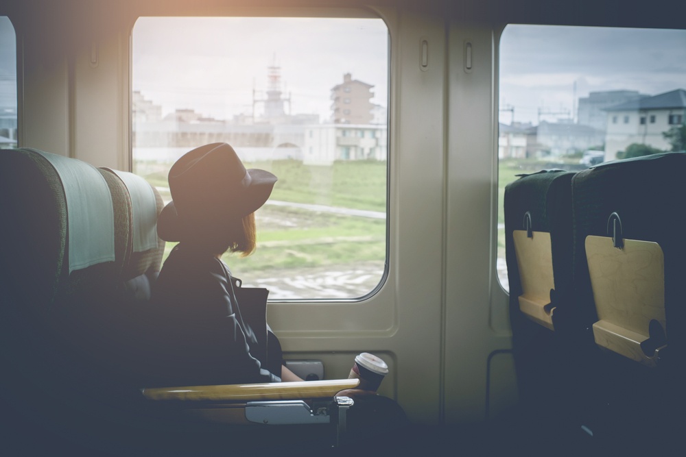 oung pretty woman traveling by the japan classic train fr